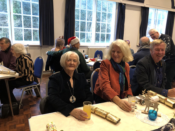 Joan, Lindy and Howard sitting at the table.
