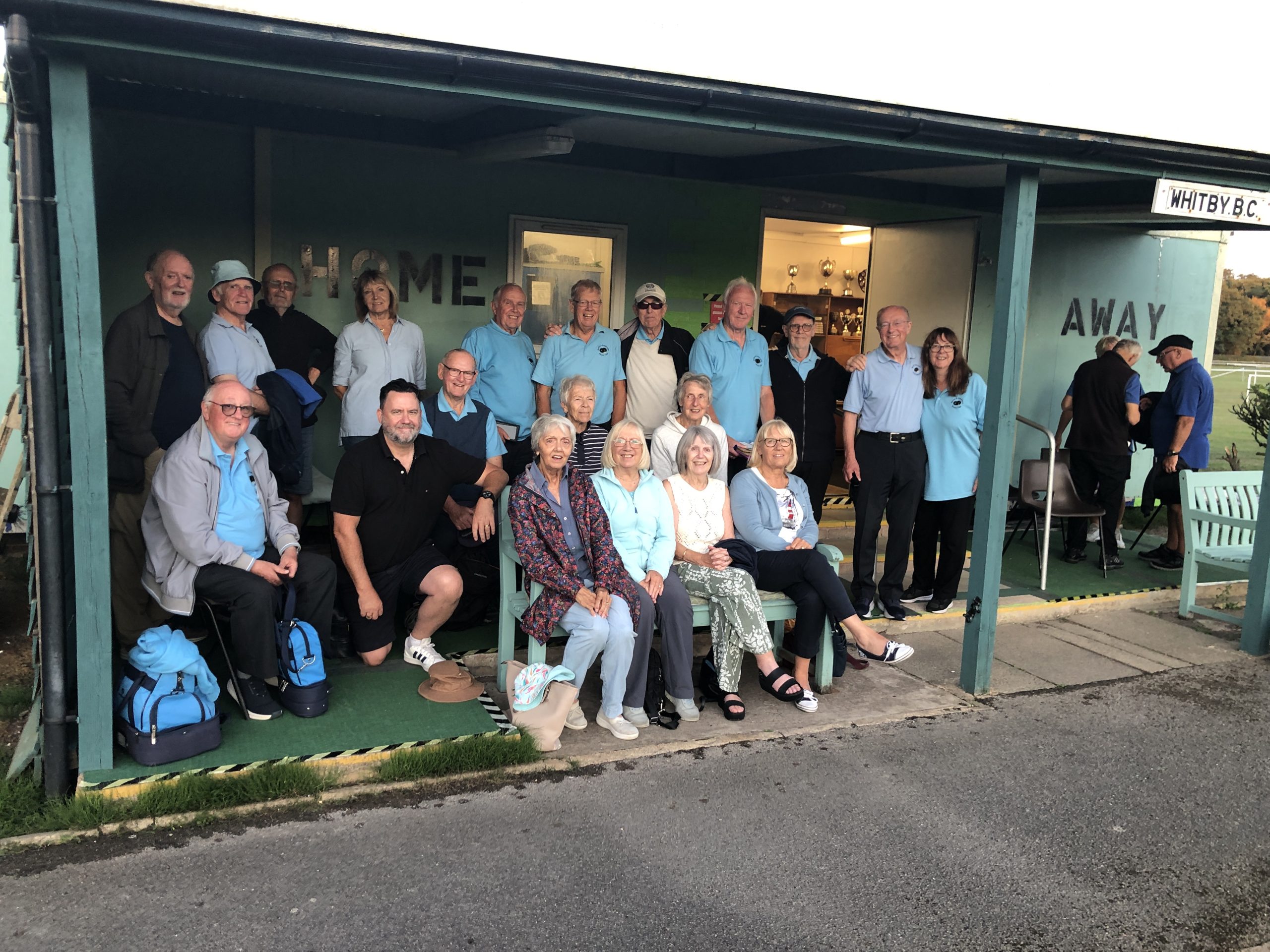 A group of B&P members standing under the shelter at Whitby Sports.